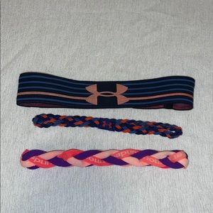 Three Under Armour head bands